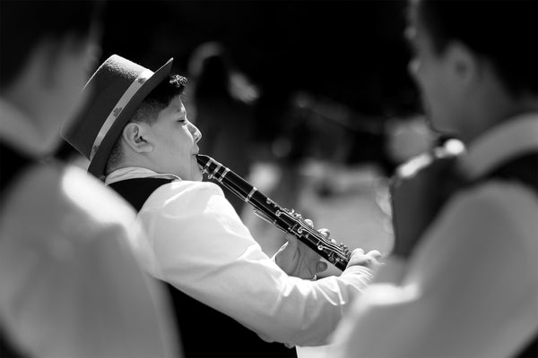 Boy plays clarinet at St. Patrick's Day Parade
