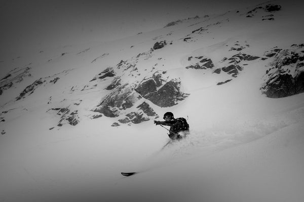 Skiier descends the East Wall of Abasin