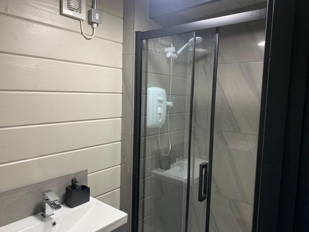 Modern bathroom area within Timber Building Specialists' granny annexe, blending functionality with style