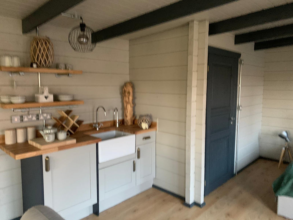 Modern kitchenette area within Timber Building Specialists' granny annexe, blending functionality with style.