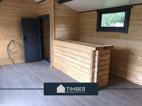 internal shot of a log cabin with bar