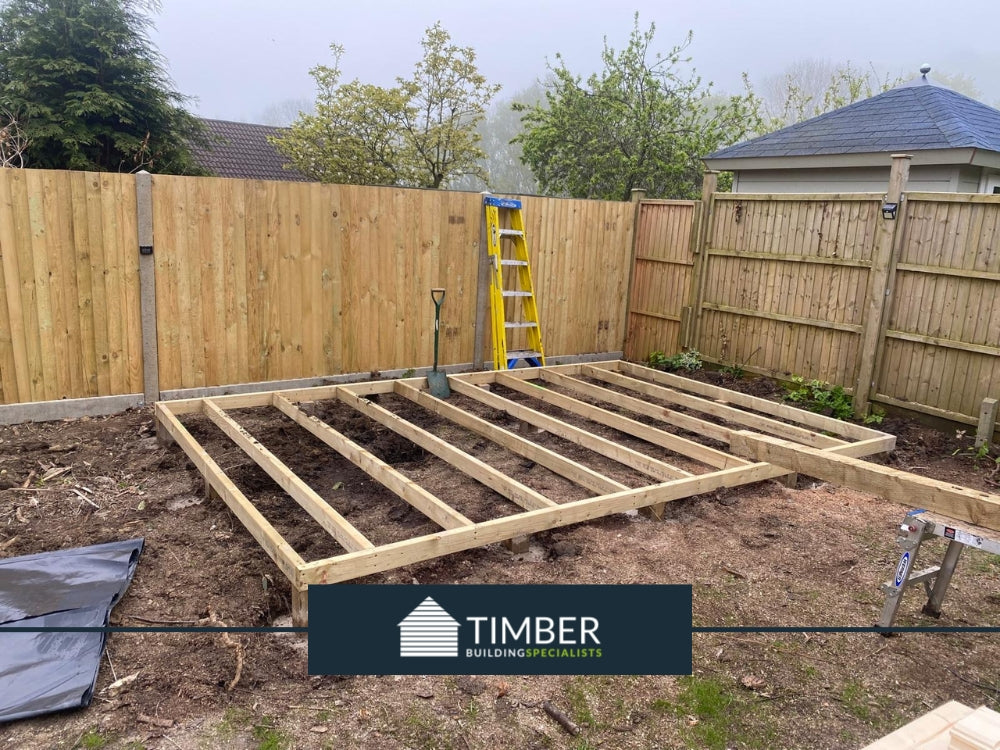 Initial timber framed base preparation for Guildford log cabin project