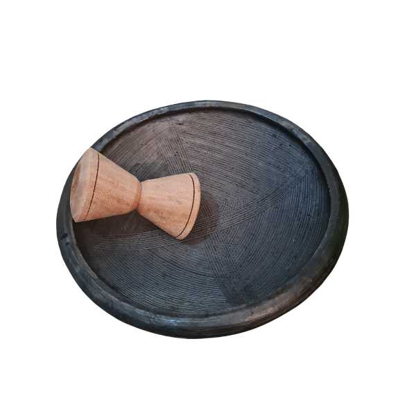 Ghanaian traditional earthen clay mortar ( Asanka ) with Wooden Pestle