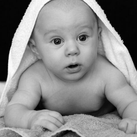 Baby's face under towel