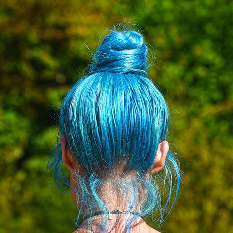 Woman with blue coloured hair - our shampoo bars are colour safe
