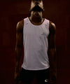 Man in white and light tan outfit