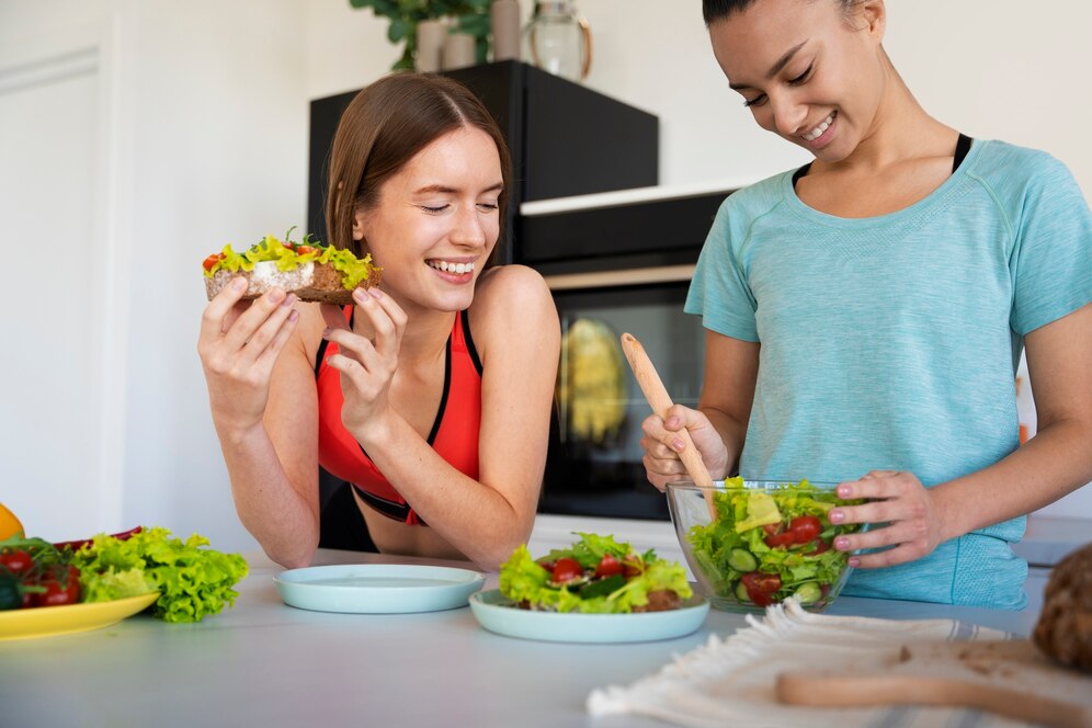 cheerful women eating health foods