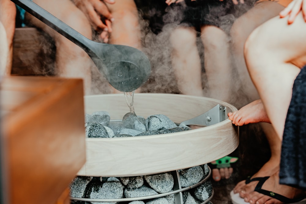 group of people inside the sauna room