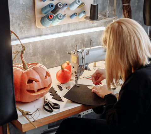 A woman is doing crafting for autumn