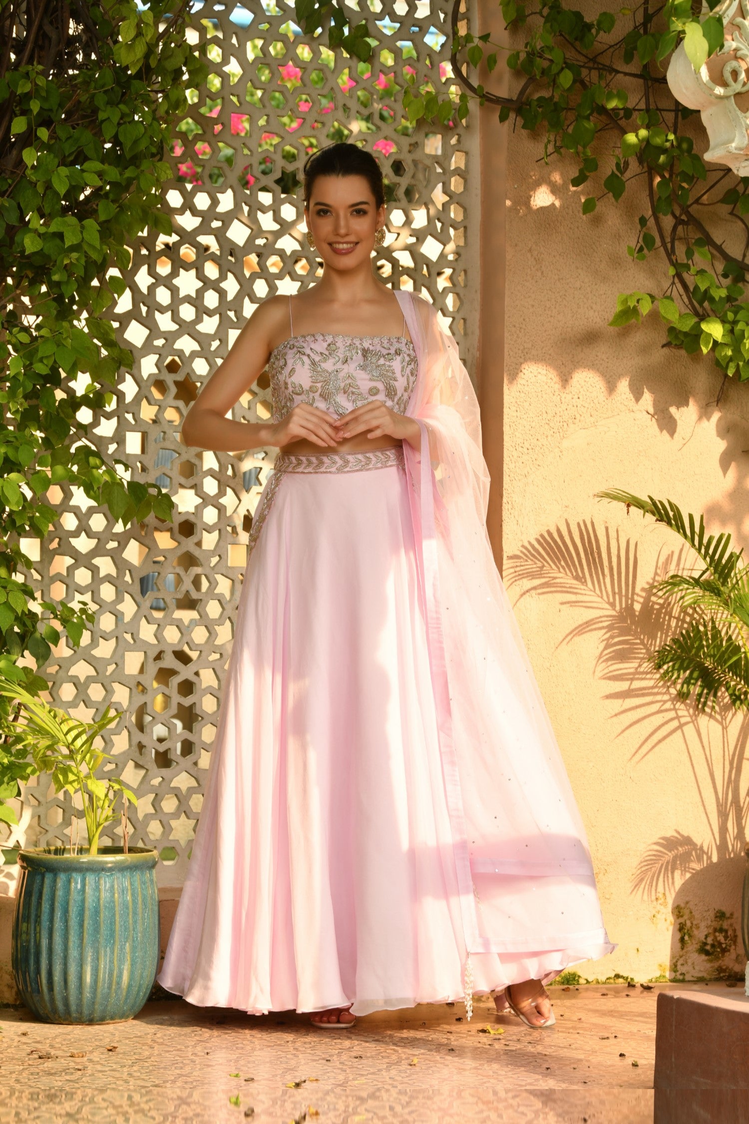 Elegant Indo-Western fusion wear featuring lehenga sets, blending traditional Indian designs with modern Western silhouettes for a chic, stylish look.