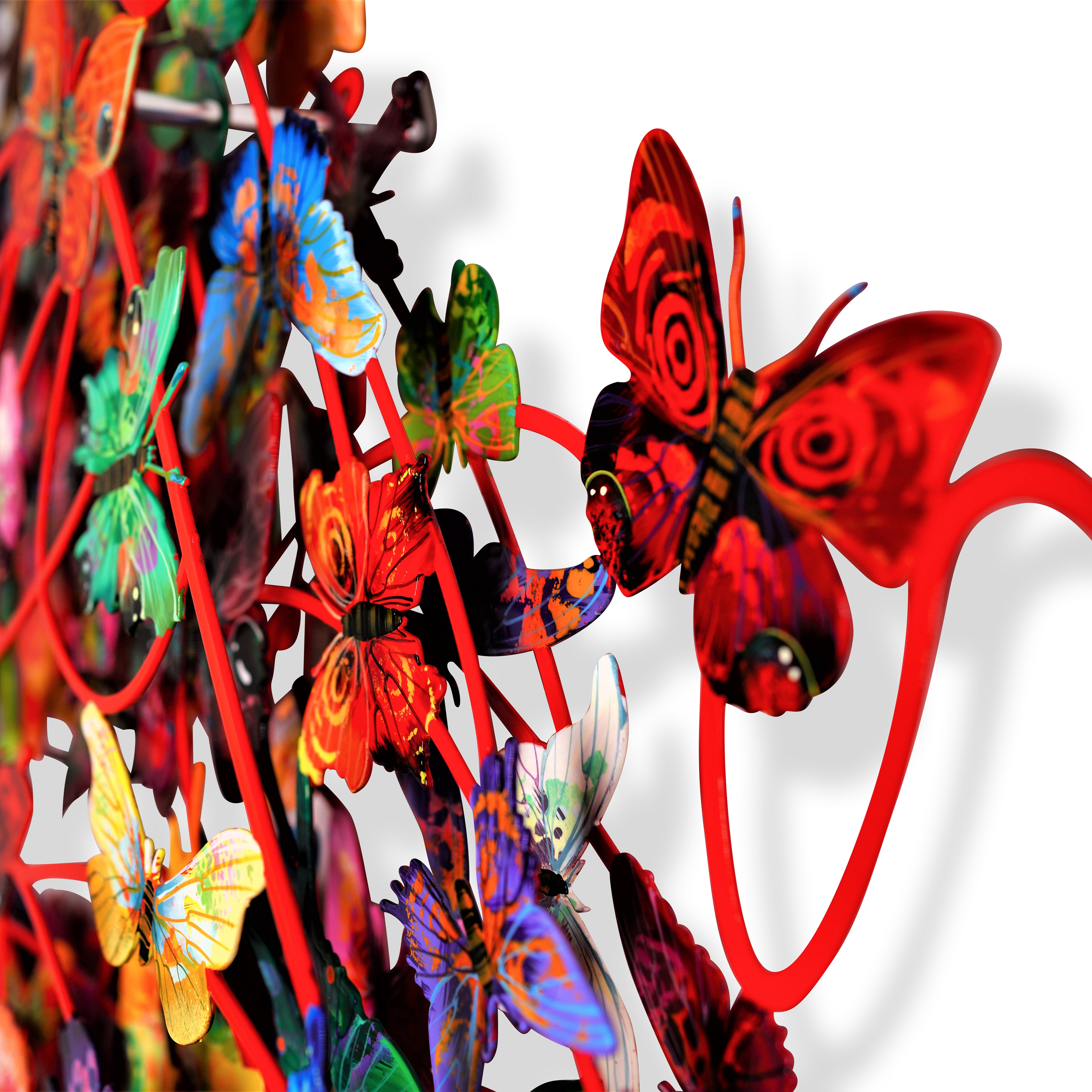close-up of 3-dimensional metal wall sculpture of butterflies