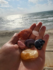 Hand full of crystals while at the beach