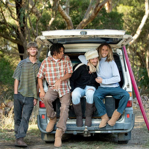 4 men in back of ute wearing Australian Made Ugg Boots