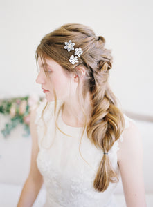 white rose hair piece