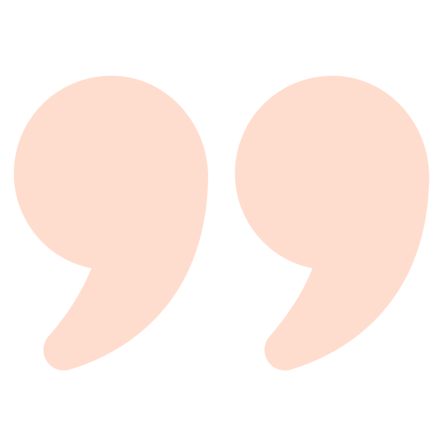 'Large peach-colored quotation mark icons.'