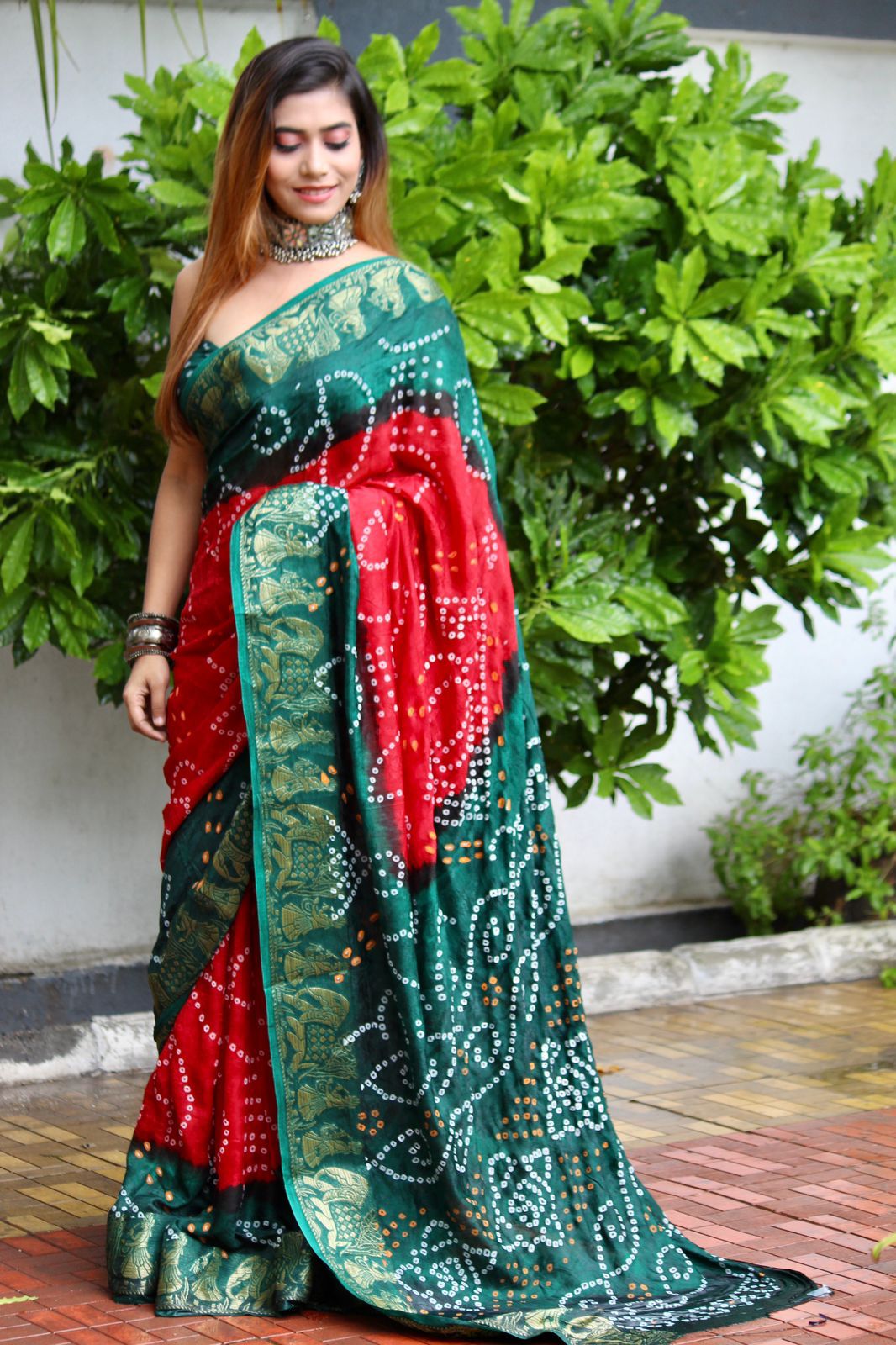 Traditional Bandhani Work Saree In Bottle Green