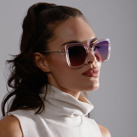 Brunette female wearing star wars x diff eyewear queen amidala sunglasses