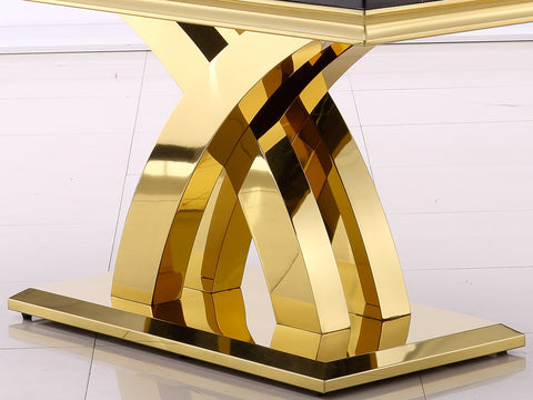 Durable and Eye-Catching Double X Base One of the most striking features of this dining table is its black and gold double X base. Crafted with mirror technology, the metal base reflects light, creating an eye-catching effect that enhances the overall aesthetics of the table. The double X design not only adds a touch of elegance but also provides exceptional stability and durability, ensuring that your dining table remains sturdy for years to come. The combination of black and gold creates a stunning contrast, making this table a true statement piece in any room.