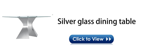 Title: The Elegant Silver Glass Dining Table: Fusion of Style and Functionality  Introduction: A glass dining table is not only a functional piece of furniture but also a stylish centerpiece that adds a touch of sophistication to any dining space. In this article, we will explore the benefits of a silver glass dining table, with a focus on the unique triangular L-shaped tapered legs and the advantages of its silver color scheme.  The Advantages of a Glass Dining Table: 1. Aesthetic Appeal: The transparent surface of a glass dining table showcases the elegant design of the table, contributing to a visually pleasing dining experience. The sleek and modern appearance of the glass complements various interior styles, blending seamlessly with any decor theme.  2. Durability and Safety: The tabletop of a glass dining table is made of tempered glass, enhancing its durability and safety. Tempered glass is more resistant to scratches and breakage than regular glass, ensuring the longevity of the table even with daily use. Additionally, in the unlikely event of the glass breaking, it shatters into small, granular pieces instead of sharp shards, minimizing the risk of injury.  3. Easy Maintenance: Cleaning and maintaining a glass tabletop is a breeze. Unlike other materials that may require specialized cleaning products or constant upkeep, a glass surface can be easily wiped clean with a damp cloth. This low-maintenance feature makes it an ideal choice for busy households or individuals seeking convenience in their dining area.  The Unique Design of the Table Legs: The silver glass dining table boasts distinctive triangular L-shaped tapered legs, which provide both visual appeal and practical benefits.  1. Visual Allure: The triangular L-shaped design of the table legs creates a captivating focal point, adding an artistic touch to the overall aesthetic. The unique shape exudes a sense of modernity and elegance, elevating the style quotient of the dining area.  2. Sturdy and Stable: The tapered legs not only enhance the table's visual appeal but also improve its stability. The cleverly designed shape ensures that the table remains steady, even when accommodating a full complement of six diners. This feature provides a secure and reliable dining experience, allowing you to enjoy meals without any wobbling or instability.  The Benefits of a Silver Color Scheme: The silver color scheme chosen for this glass dining table offers additional advantages:  1. Versatility: Silver is a versatile color that effortlessly integrates into various interior themes. It complements a wide range of colors, materials, and design styles, allowing the dining table to harmonize with the existing decor or serve as a focal point in a minimalist setting.  2. Reflective Properties: The silver finish on the table creates a reflective surface that helps maximize the available light in the dining area. It enhances the sense of brightness and space, making the room appear larger and more inviting.  Conclusion: A silver glass dining table effortlessly marries style and functionality, making it an excellent choice for any dining space. With its transparent and durable tempered glass tabletop, it offers not only aesthetic appeal but also easy maintenance and safety. The unique triangular L-shaped tapered legs provide stability and visual allure. The silver color scheme enhances its versatility and reflective properties, further elevating your dining experience. Choose the elegance and sophistication of a silver glass dining table to create a stunning centerpiece that brings both utility and style to your home.