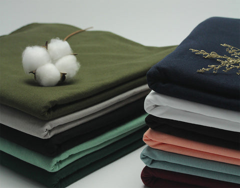 different cotton fabrics stacked | Lèlior Blog