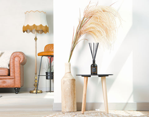 interior of home with reed diffuser on table | Lèlior Home Scenting Blog Image