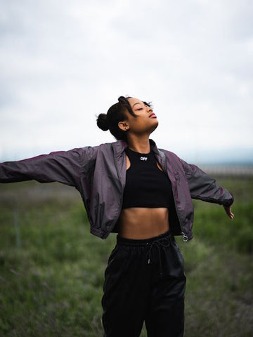 Woman practicing Tai Chi for balance.