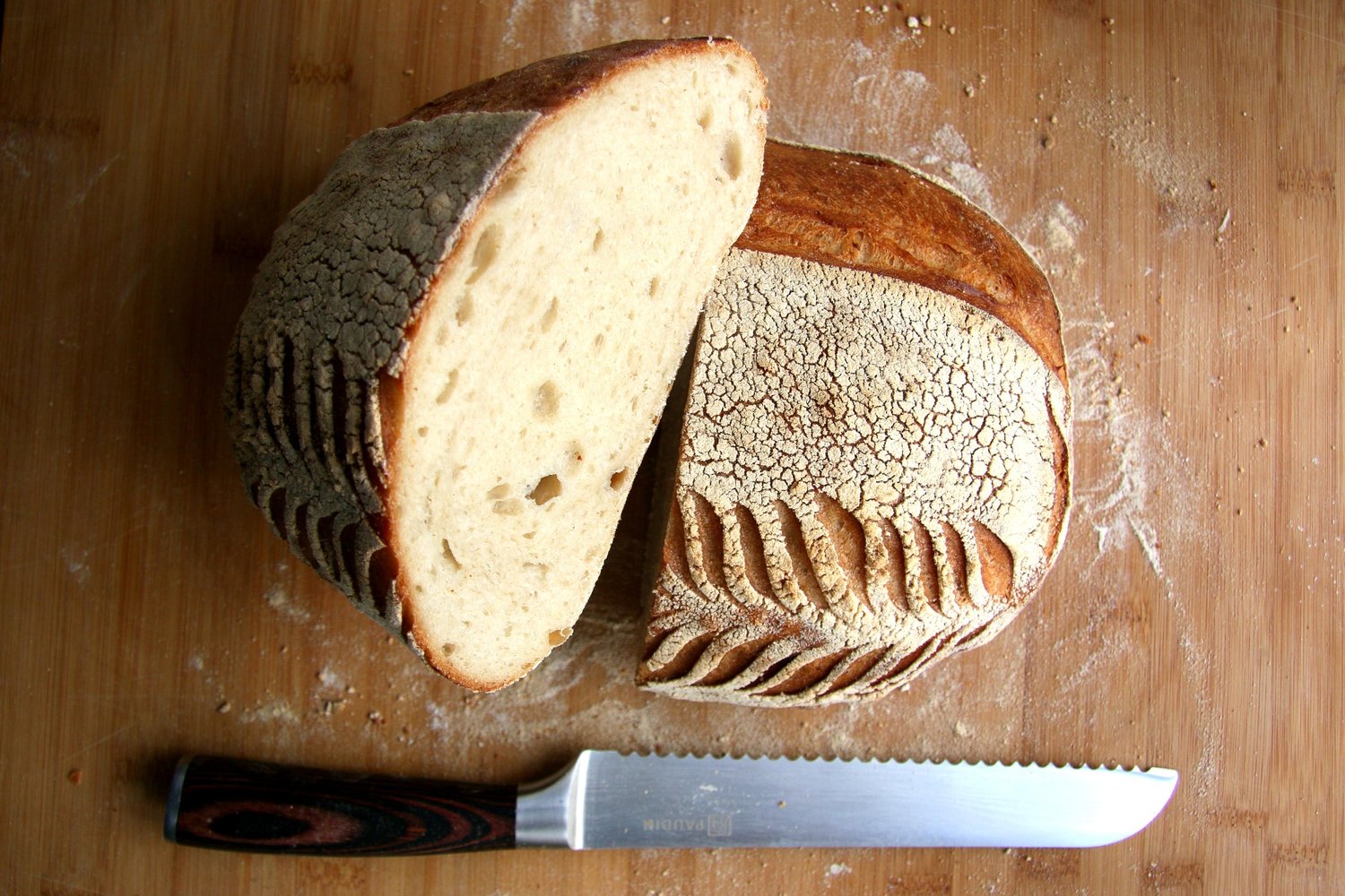Bread loaf being cut
