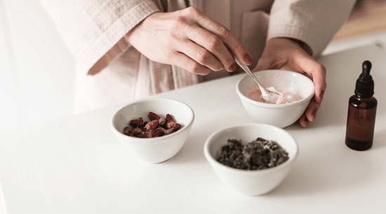 woman mixing DIY skincare recipes at home using natural ingredients