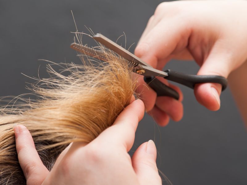 Trimming hair regularly to prevent split ends