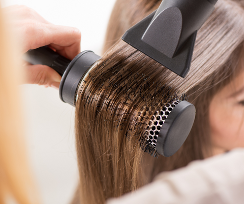 blow drying hair