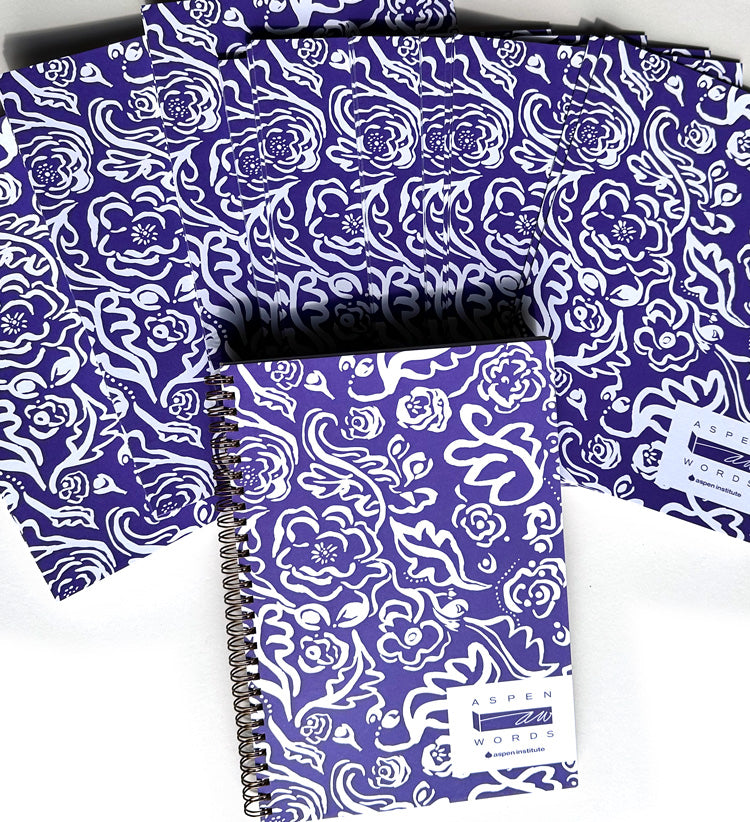 purple floral notebook covers with finished notebook on top