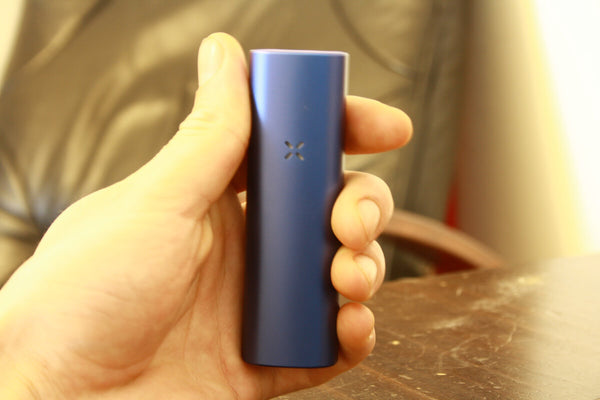 Pax plus in a hand