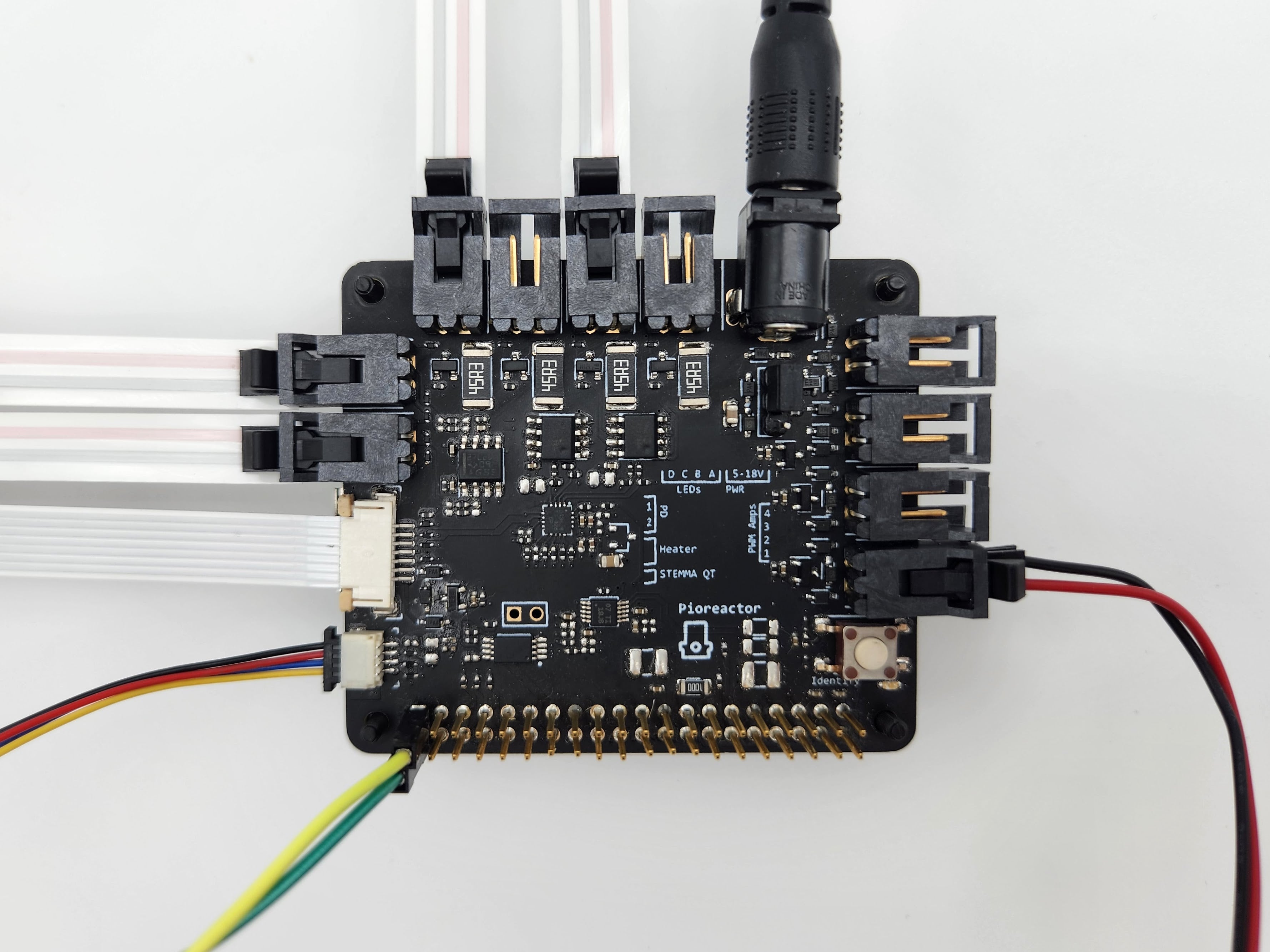 All the input/output of the Pioreactor HAT: 2x photodiodes, 4x LEDs, 5-18V aux power supply, 4x PWM, 40 pin GPIO, heater PCB, StemmaQT.