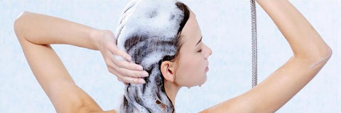 What is the ideal temperature for washing your hair?