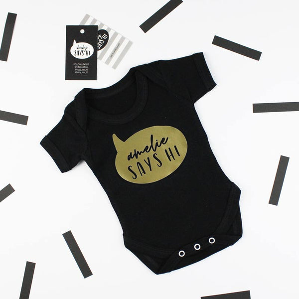 baby says hi black t shirt with gold writing
