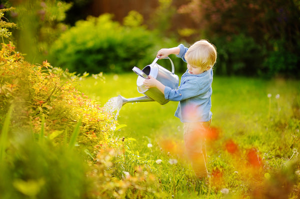 Easy Summer Activities For Babies and Toddlers Watering plants