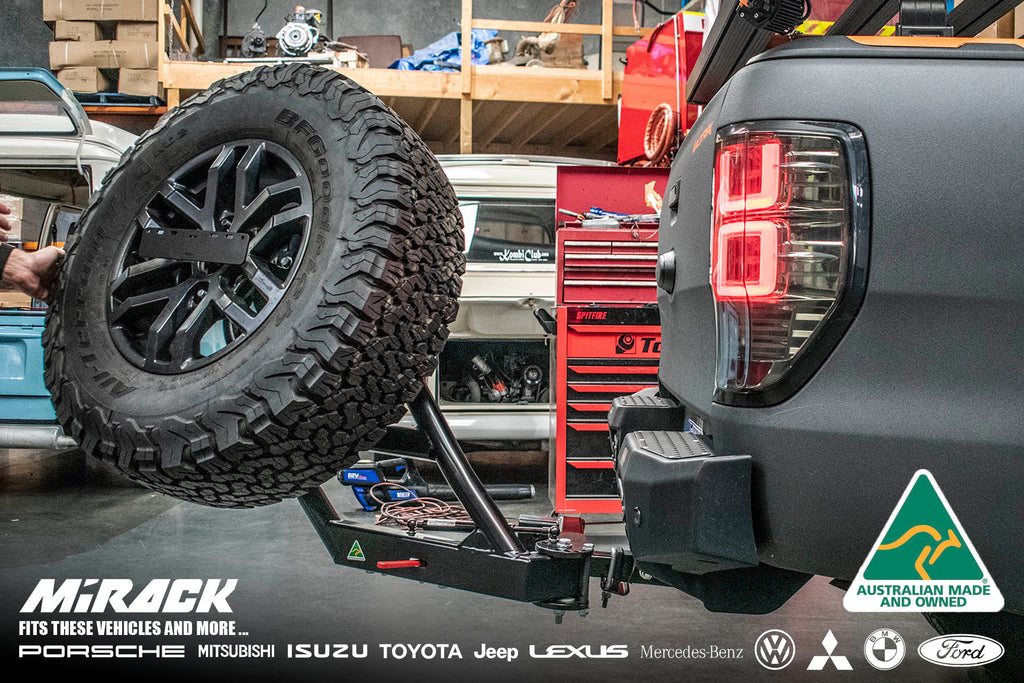 View of Ford Raptor with Mirack swing-out spare wheel carrier and license plate holder, close up shot in action