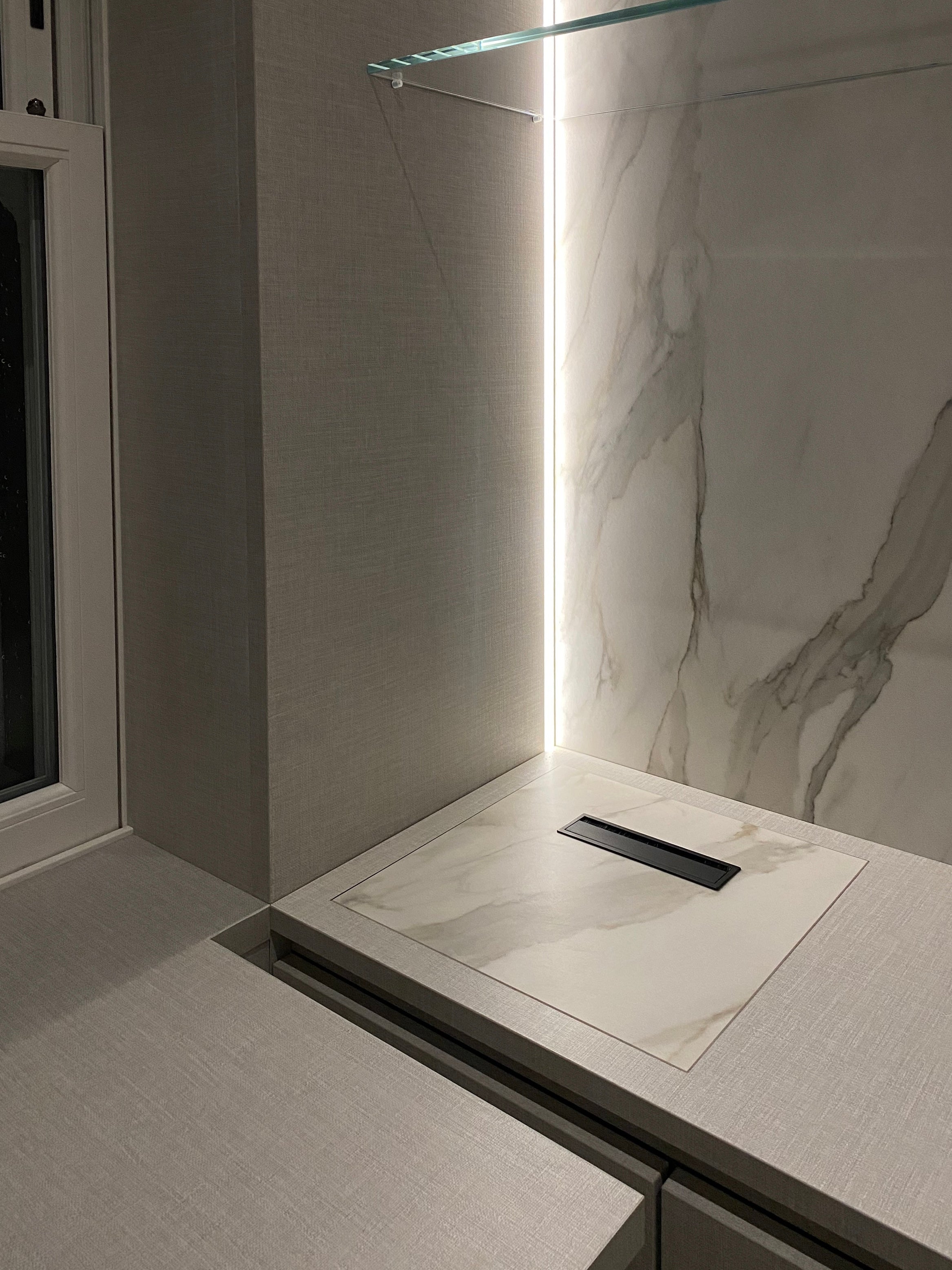 Large format porcelain integrated into wardrobe furniture