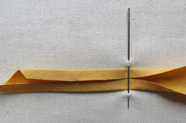 Making bias binding with a pin or needle