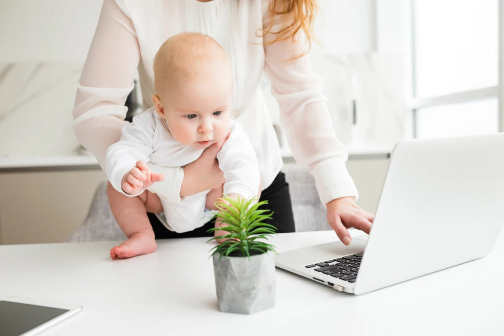 baby in front of laptop