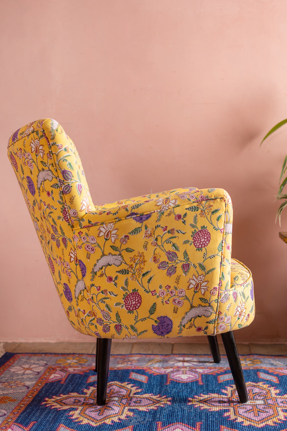 yellow floral armchair