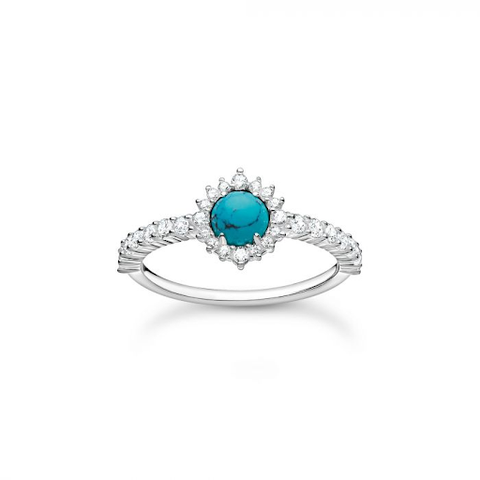 diamond ring with a blue stone
