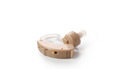 Modern hearing aids displayed on a table, showcasing their sleek design and technology