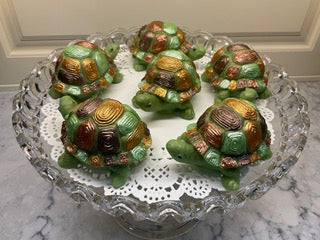 Turtle shaped soap in variations of green and copper