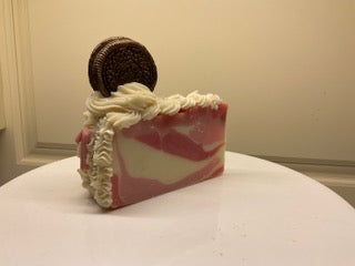 pink and cream slice of cake soap with oreo on top