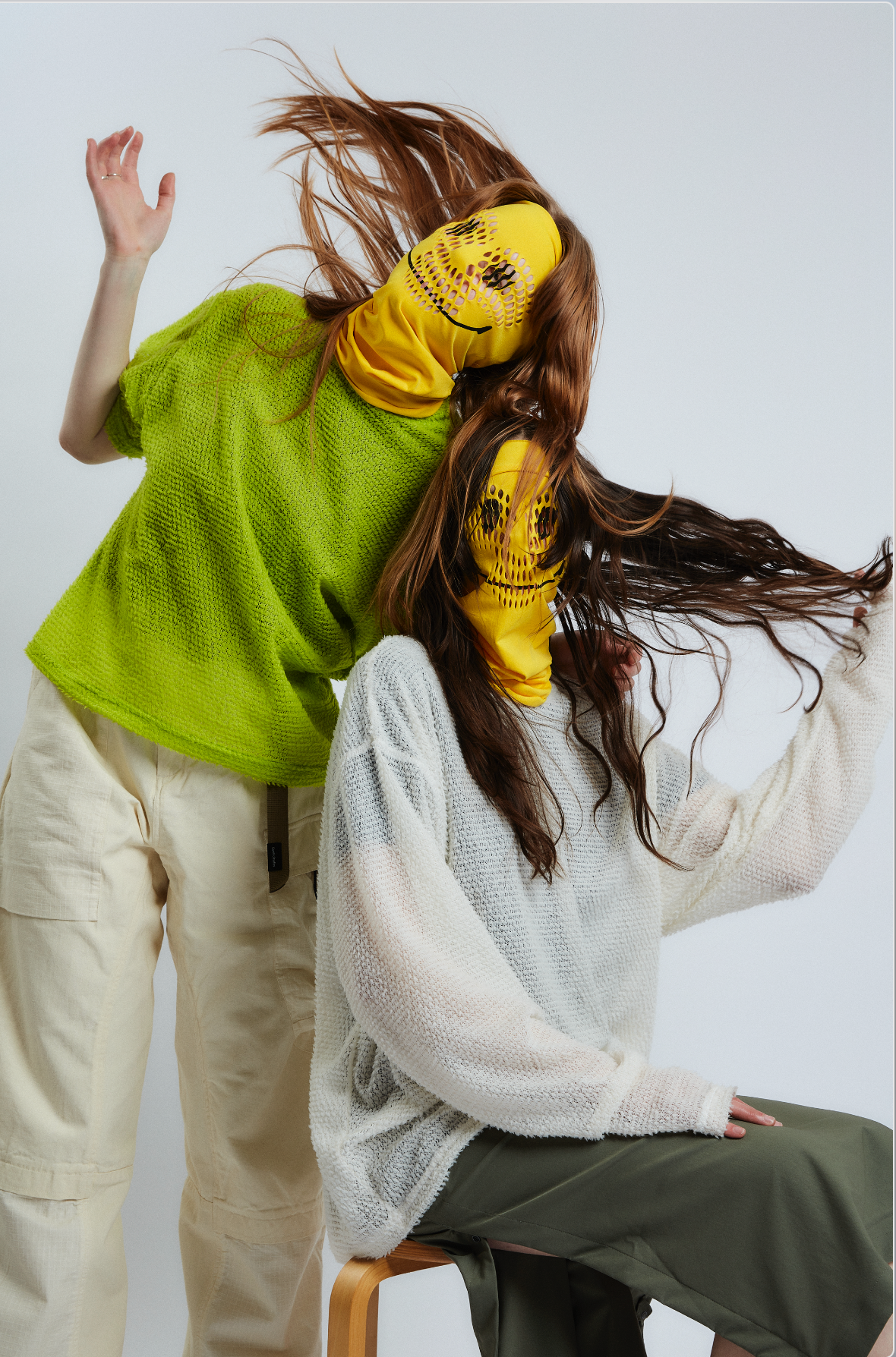 Two women flinging their hair in alpha fleece and Gnuhr gaiters