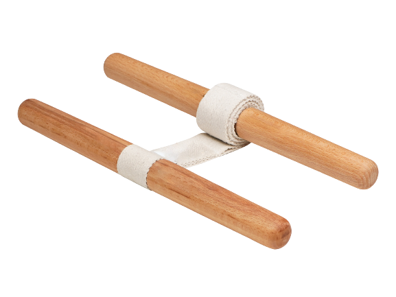 Two wooden sticks connected by a white cloth strap.