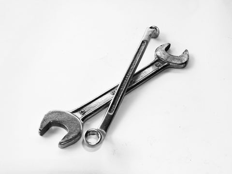 spanner crossing each other on white background
