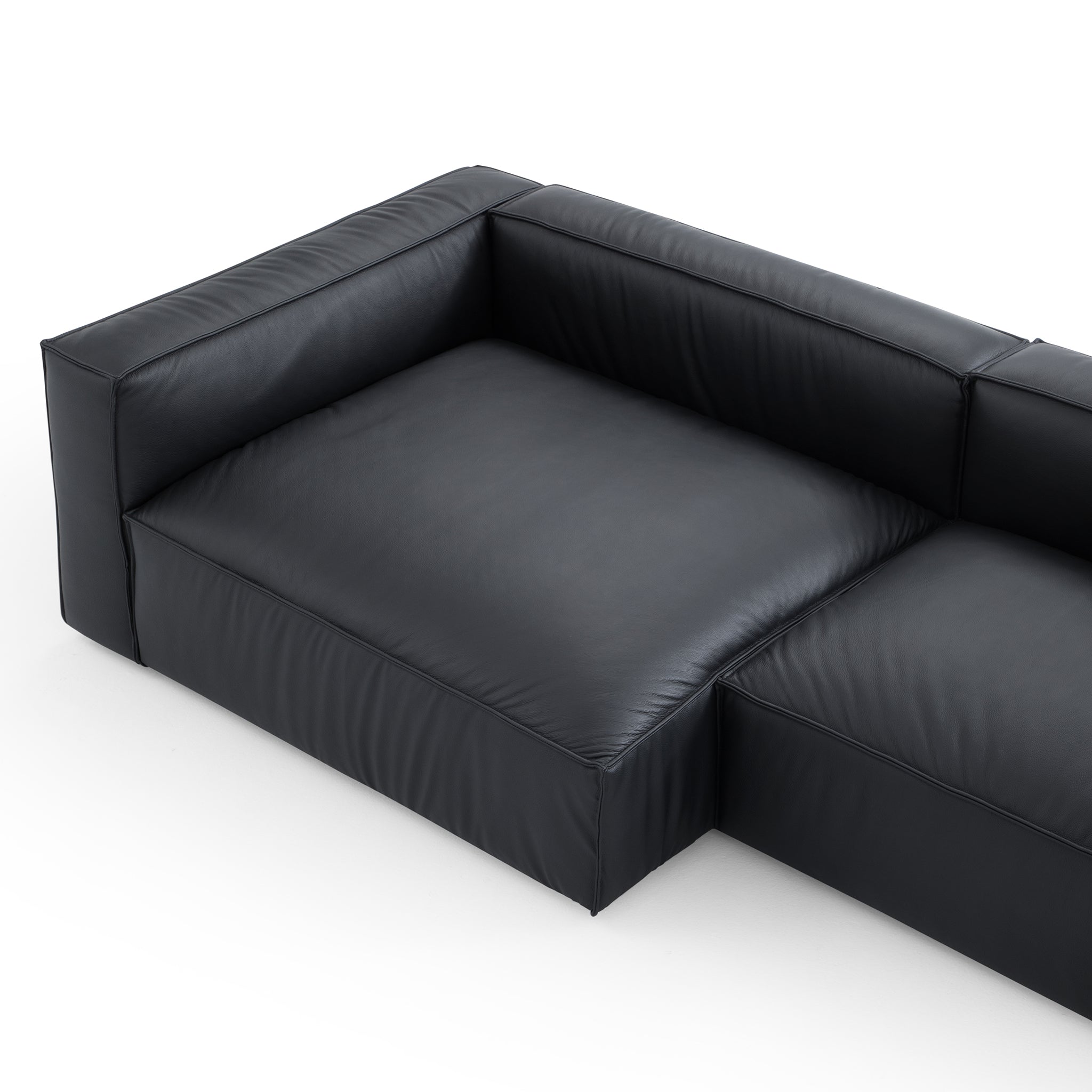 Luxury Minimalist Black Leather Sectional And Ottoman