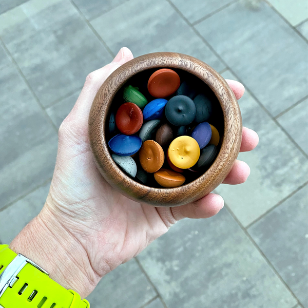 wooden bowl containing ecopods